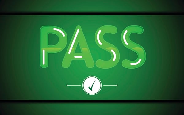 a green background with pass written in green and a tick.