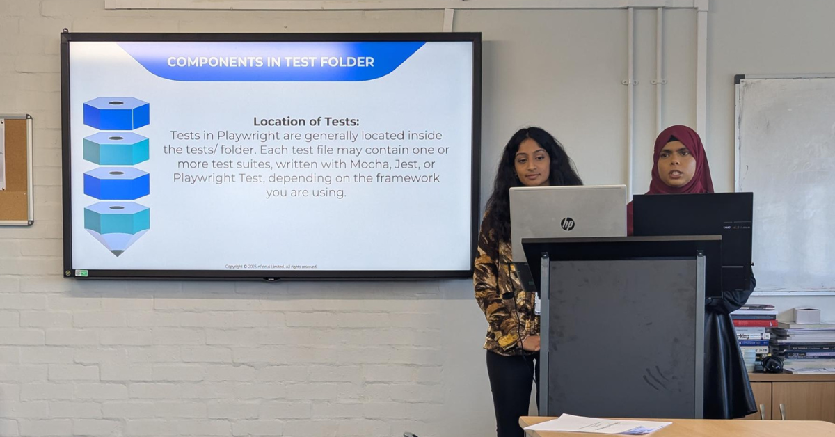 Nethma and Fathima presenting to students 